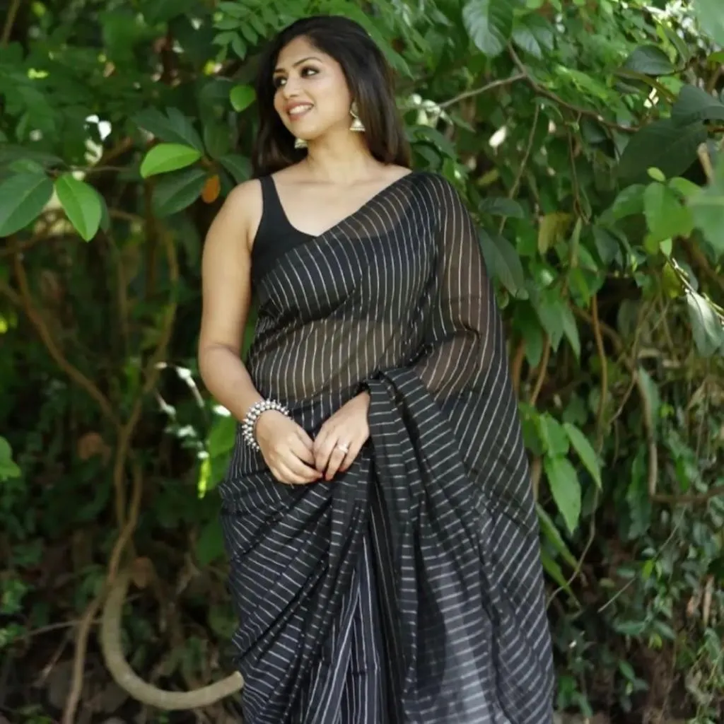 Cynosure Black Soft Silk Saree With Whimsical Blouse Piece