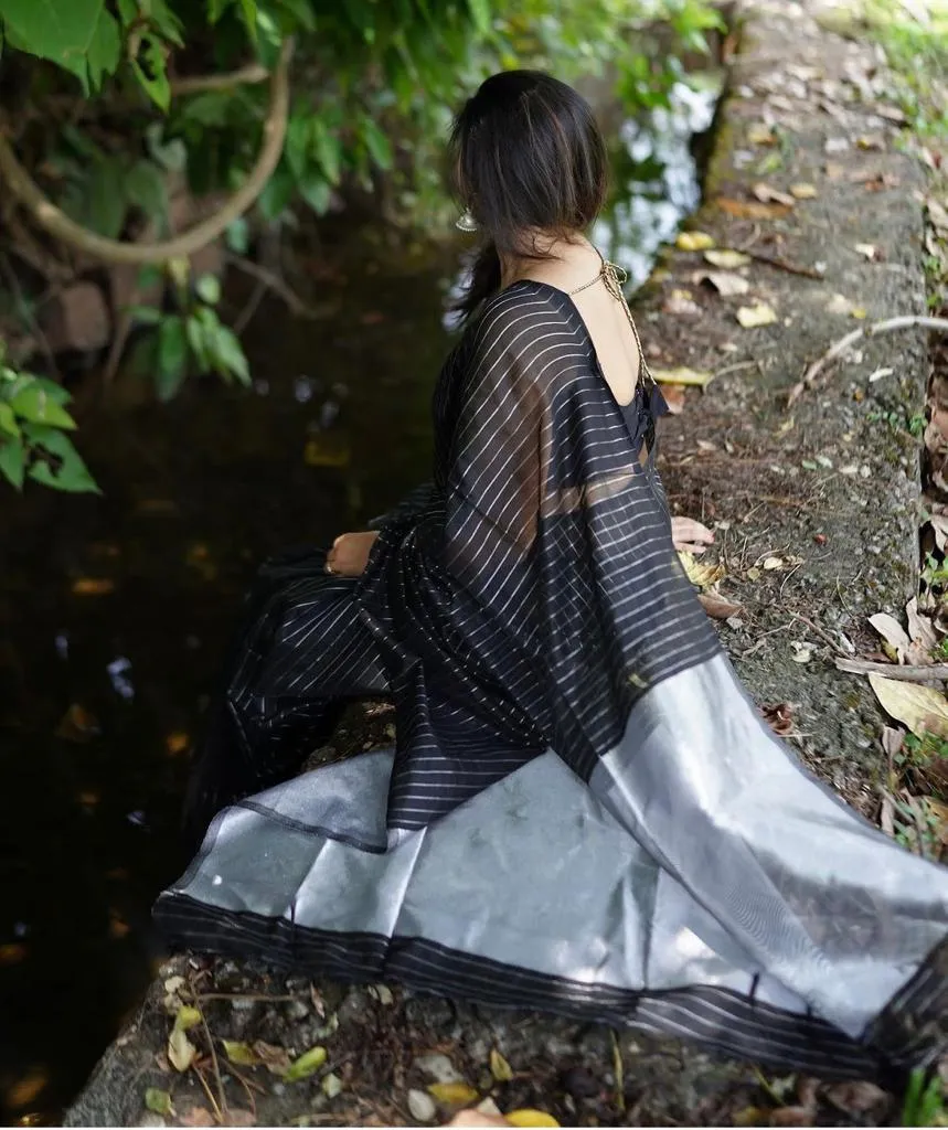 Cynosure Black Soft Silk Saree With Whimsical Blouse Piece