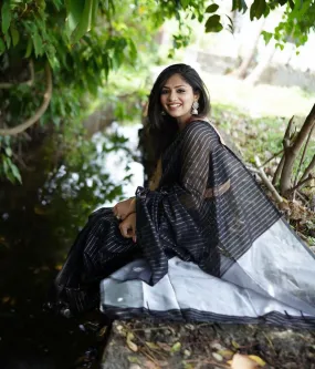Cynosure Black Soft Silk Saree With Whimsical Blouse Piece
