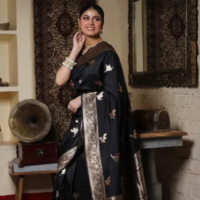 Mesmeric Black Soft Silk Saree With Inspiring Blouse Piece