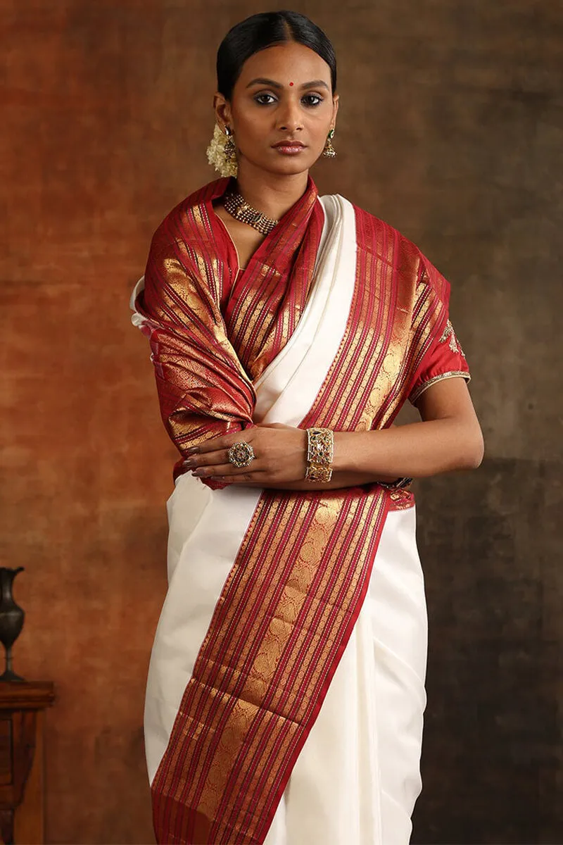 Splendorous Off White Soft Silk Saree With Serendipity Blouse Piece