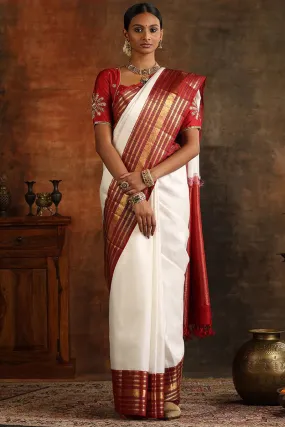 Splendorous Off White Soft Silk Saree With Serendipity Blouse Piece
